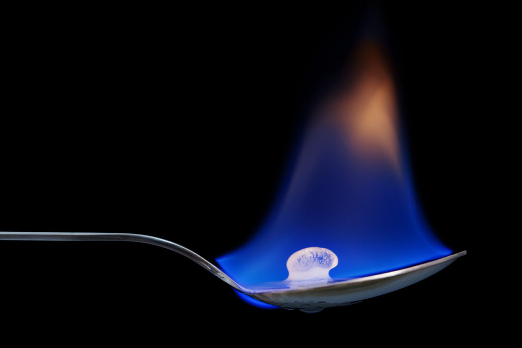 Trauma Is Chemistry 1 Ice Cube In Flames On A Spoon